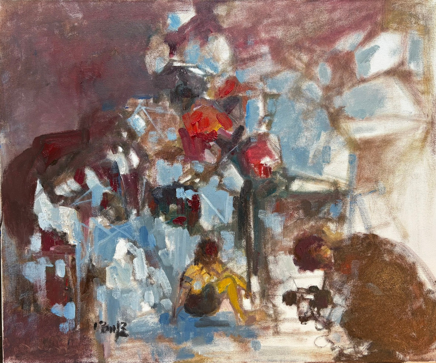 Kid Sitting Benealth the Sculptures